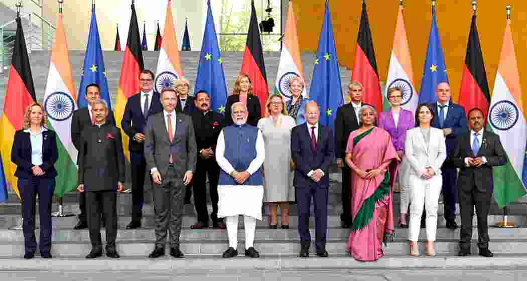 Global leaders pose for a family photograph during the G7 Summit in 2022, highlighting discussions on global security, economic recovery, climate action and international cooperation.