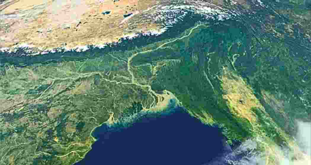 Aerial view of the Ganga-Brahmaputra delta, where rapid land subsidence combined with rising sea levels is intensifying flood risks for millions living in low-lying coastal regions. Aerial view of the Ganga-Brahmaputra delta, where rapid land subsidence combined with rising sea levels is intensifying flood risks for millions living in low-lying coastal regions.