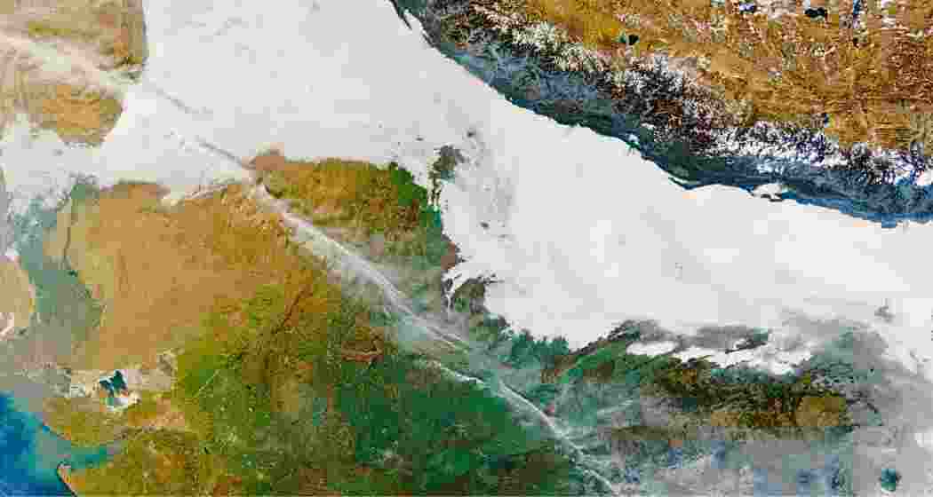 NASA satellite imagery captures dense fog blanketing the Indo-Gangetic Plain in winter.