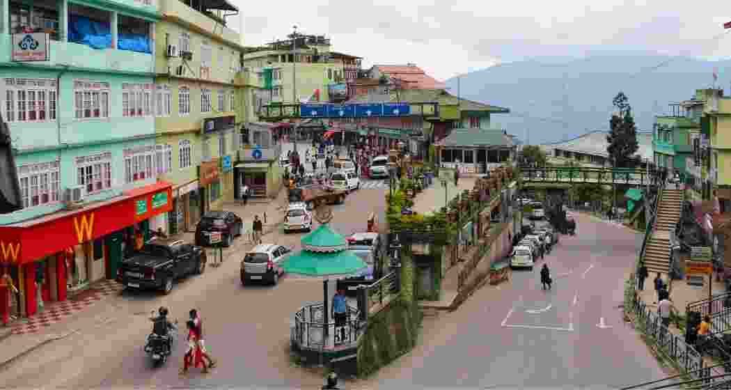 Vehicles ply through Gangtok town as Sikkim enforces an odd-even vehicle rule across the state from Monday.