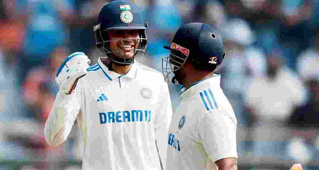 India's batter Shubman Gill celebrates with Rishabh Pant after his half century during the second day of the third Test cricket match between India and New Zealand, at Wankhede Stadium, in Mumbai, Saturday, Nov. 2, 2024. 