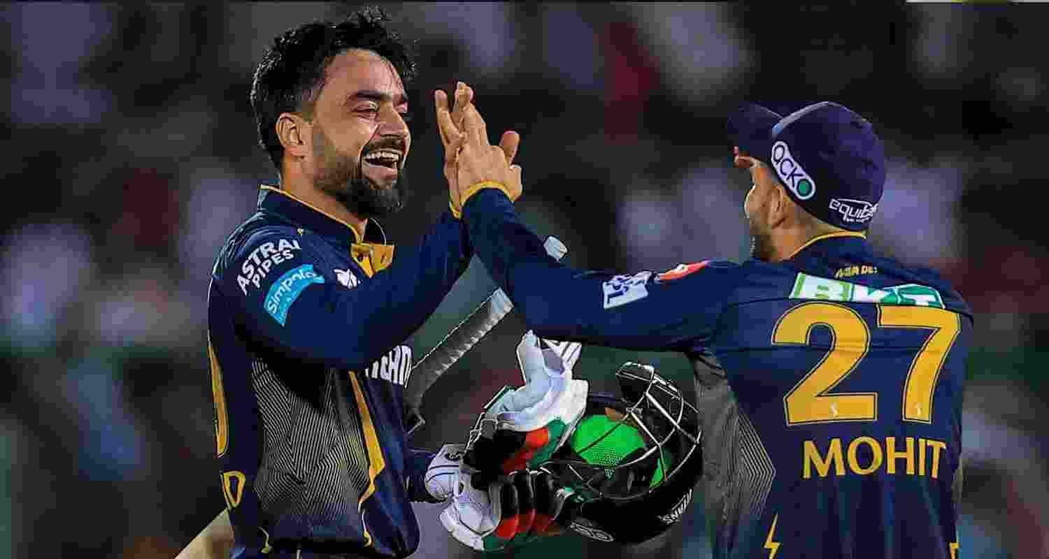 Rashid Khan celebrates after GT wins. 