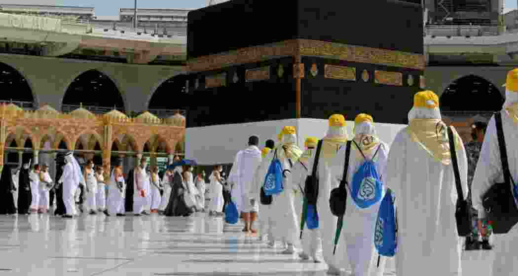 Pilgrims at the Kaaba, Islam's holiest shrine, at the Grand mosque in the holy city of Meccca.