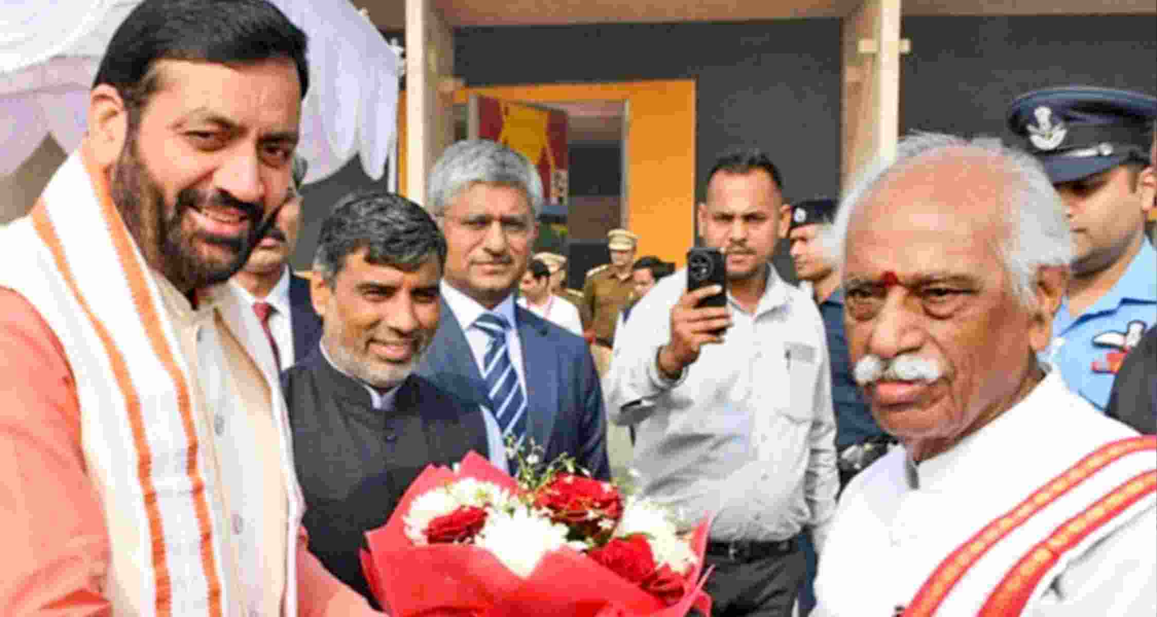 Haryana Governor Bandaru Dattatraya greets Chief Minister Nayab Singh Saini during the beginning of the winter session of the state Legislative Assembly, in Chandigarh. 