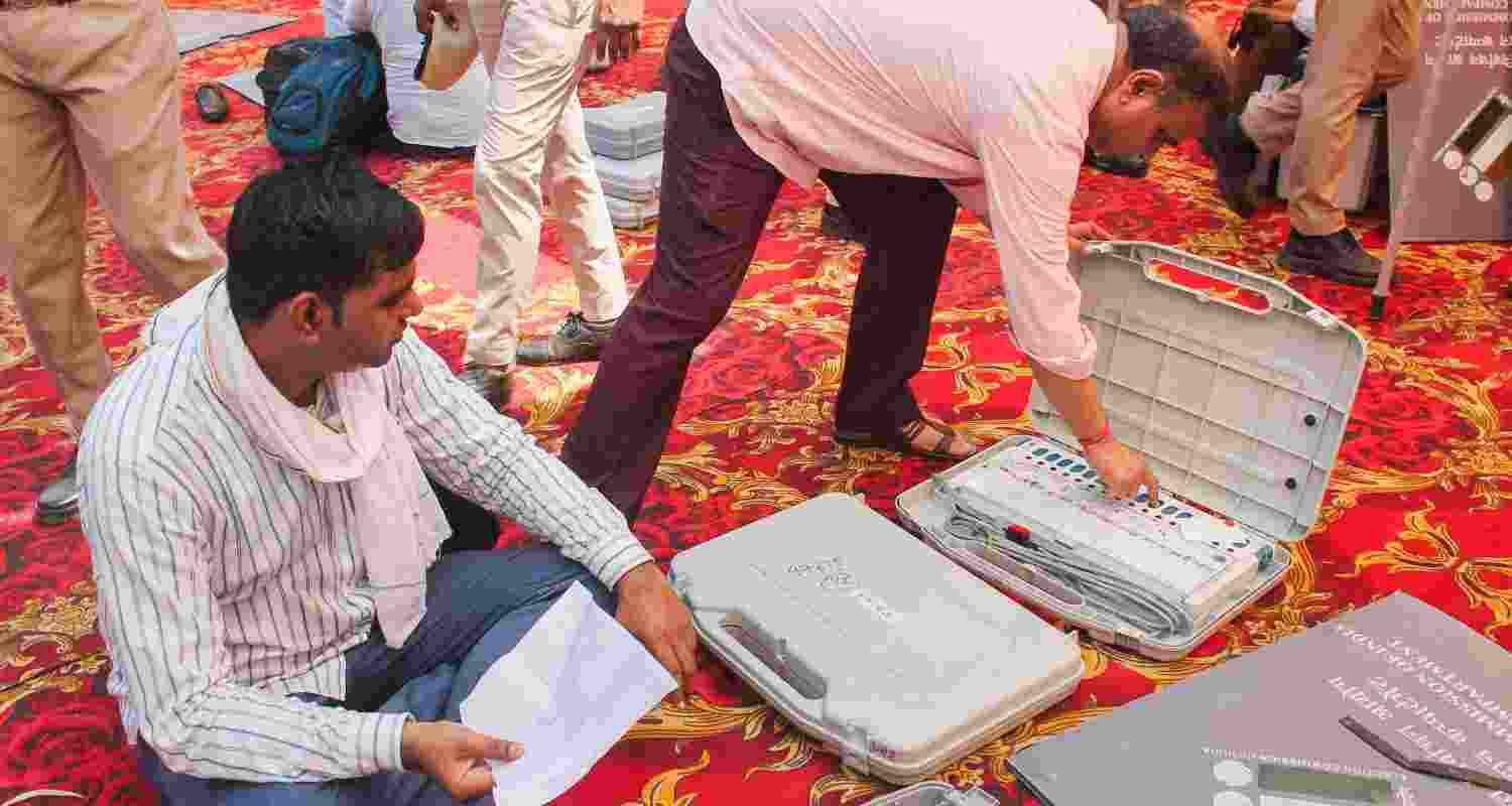 Polling officials check election material before leaving for their designated polling stations on the eve of the sixth phase of Lok Sabha polls, in Faridabad, Friday, May 24, 2024. Polling officials check election material before leaving for their designated polling stations on the eve of the sixth phase of Lok Sabha polls, in Faridabad, Friday, May 24, 2024.