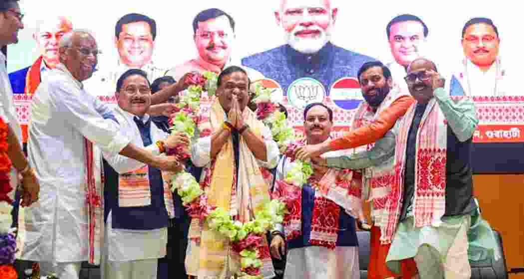 Newly elected leader of the Assam BJP Legislature Party Himanta Biswa Sarma being garlanded by Union Minister and former BJP National President J.P. Nadda, Haryana Chief Minister Nayab Singh Saini, AGP President Atul Bora and Assam BJP President Dilip Saikia during the Assam BJP Legislature Party meeting at the Atal Bihari Vajpayee Bhawan in Guwahati, on Sunday.