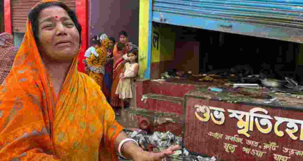 A woman breaks down after her restaurant was vandalised by hooligans in Murshidabad on April 12, during mob violence triggered by protests against the Waqf (Amendment) Act.