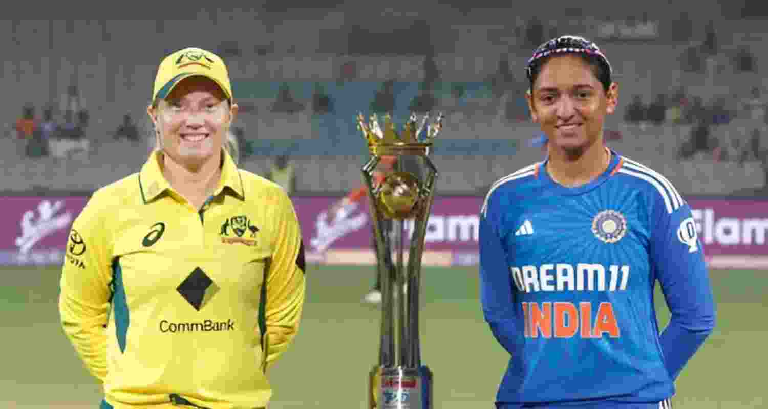 The Indian and Australian skippers posing with the trophy ahead of their semfinal match. The Indian and Australian skippers posing with the trophy ahead of their semfinal match.