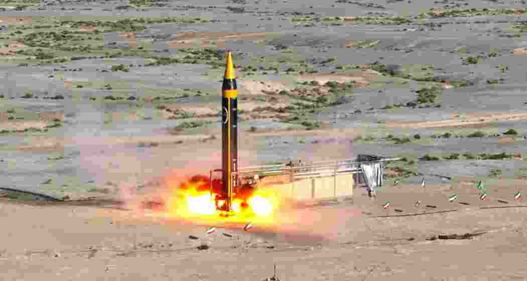 Caption: Iran launches a ballistic missile projected at the US base in Jordan after American airstrikes, escalating tensions in the region as both sides trade direct military strikes on Wednesday.