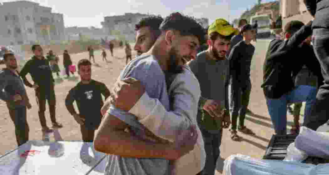 A Palestinian man weeps beside a truck loaded with bodies of those killed in Israeli overnight airstrikes, awaiting burial from the Indonesian Hospital in Beit Lahiya, northern Gaza, on 18 March 2025.