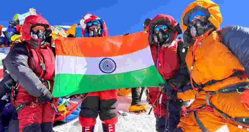 Members of ITBP’s first all-women Mount Everest expedition pose with the tri-colour after successfully summiting the world’s highest peak through the South Col route from the Nepal side.