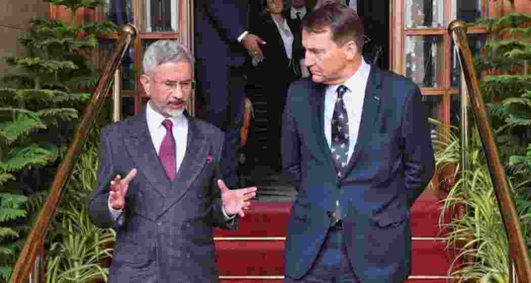 External Affairs Minister S Jaishankar speaks with Polish Foreign Minister Radoslaw Sikorski in Delhi on Monday. (Photo: X/@DrSJaishankar)