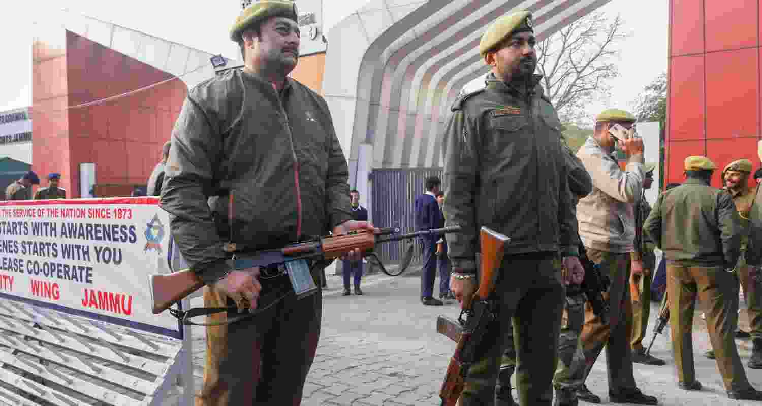 Security personnel stand guard outside the Maulana Azad Stadium, ahead of the Republic Day 2025 function, in Jammu, Tuesday. 