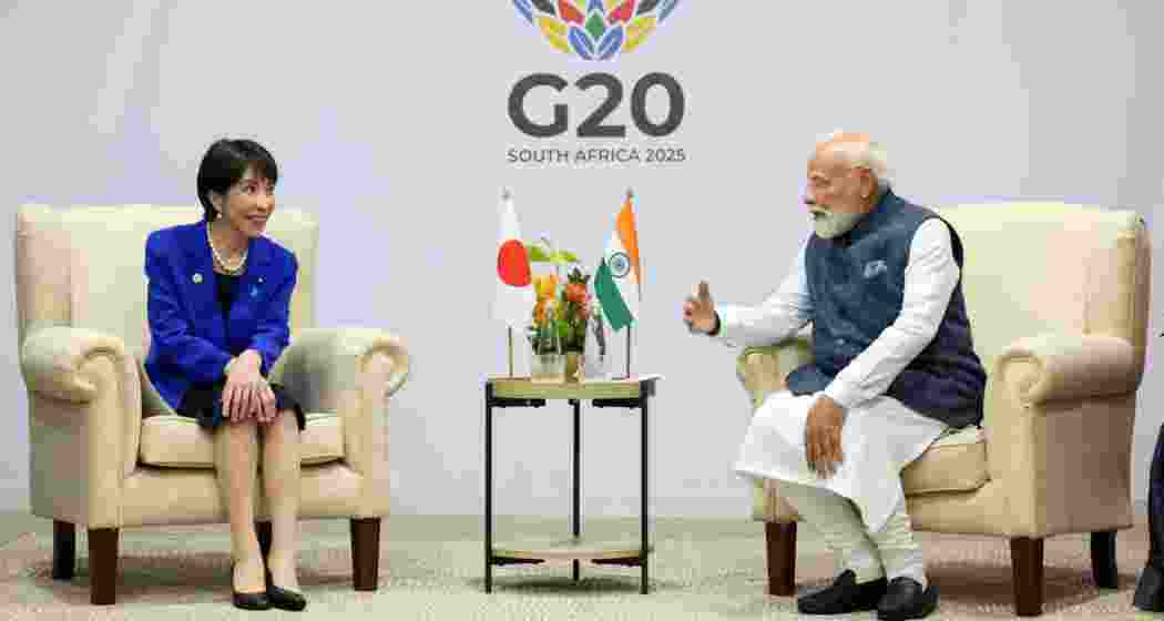 Prime Minister Narendra Modi (R) with his Japanese counterpart Sanae Takaichi (L) on the sidelines of the G20 Summit in Johannesburg.
