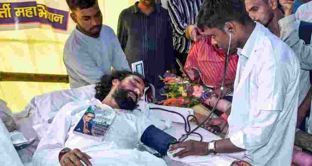 Student leader Devendra Nath Mahto being checked by doctors during his hunger strike in Ranchi.