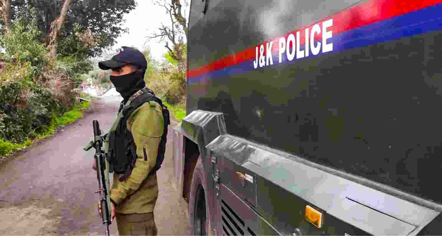 A security personnel stands guard during a search operation to flush out terrorists who opened fire on an Army vehicle the previous day, near the Line of Control (LoC) in the Sunderbani sector of J&K's Rajouri district. A security personnel stands guard during a search operation to flush out terrorists who opened fire on an Army vehicle the previous day, near the Line of Control (LoC) in the Sunderbani sector of J&K's Rajouri district.