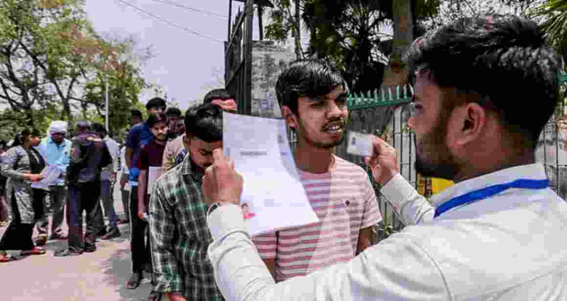 Aspirants undergo security check before appearing for the National Eligibility-cum-Entrance Test (NEET-UG) examination.