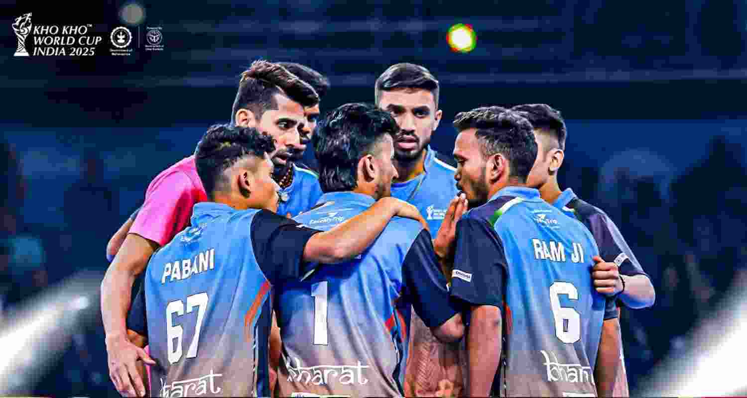 Indian team huddle before the match against Nepal.