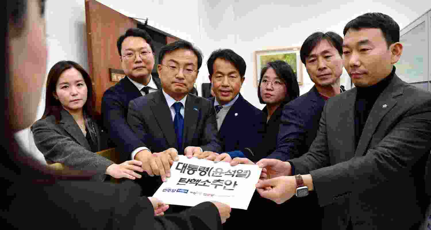 Opposition MPs submit the impeachment motion against President Yoon Suk Seol.