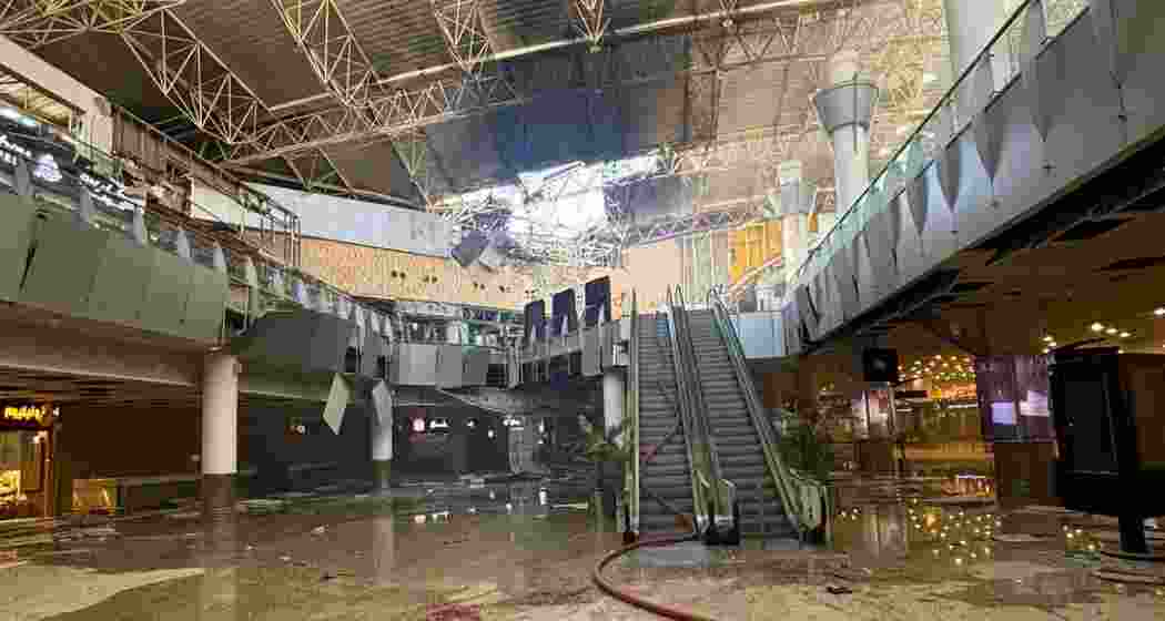 Damage to a terminal building at Kuwait International Airport following an Iranian drone strike on June 3. The attack disrupted flight operations and killed an Indian national, according to authorities.