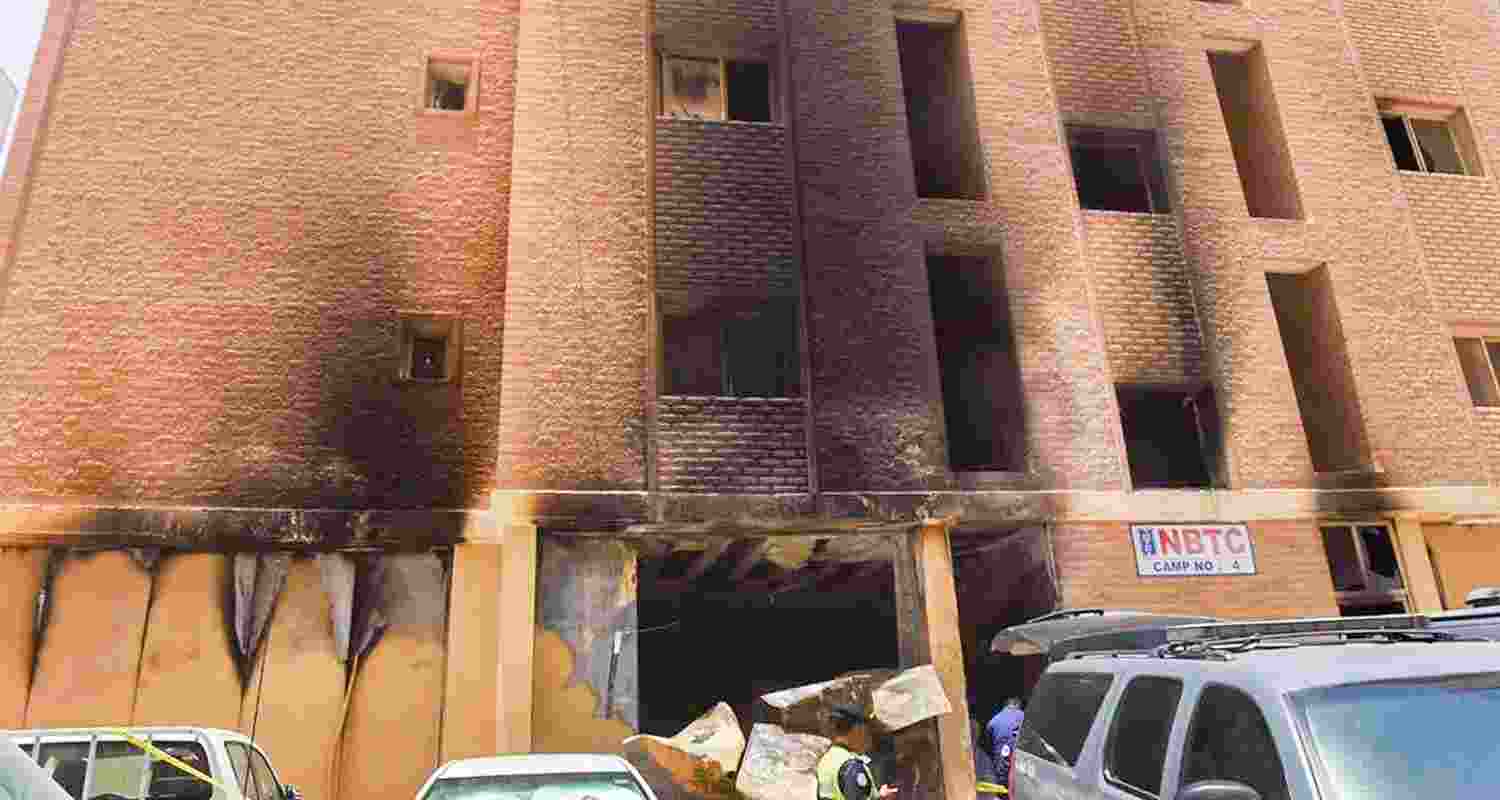 The building reportedly had nearly 160 people living in it. They are workers of the same company and many of them are believed to be Indians. The building reportedly had nearly 160 people living in it. They are workers of the same company and many of them are believed to be Indians.