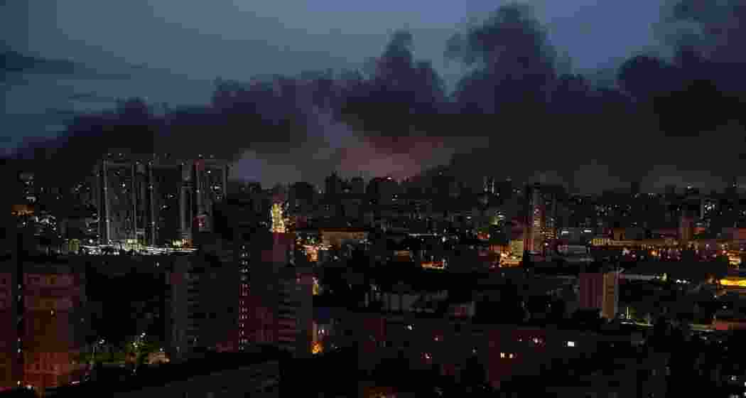 Flames and smoke rise near Kyiv’s Zhuliany International Airport following Russia’s missile and drone barrage in the early hours of July 4, 2025. At least 14 people were injured.