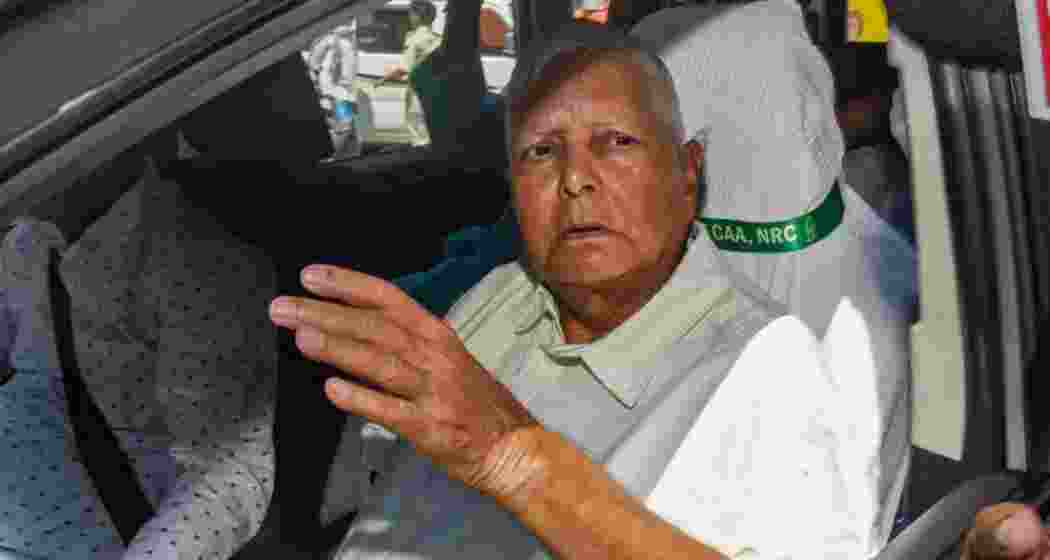 Rashtriya Janata Dal (RJD) president and former Bihar Chief Minister, Lalu Prasad heading towards the ED's office on Wednesday. 