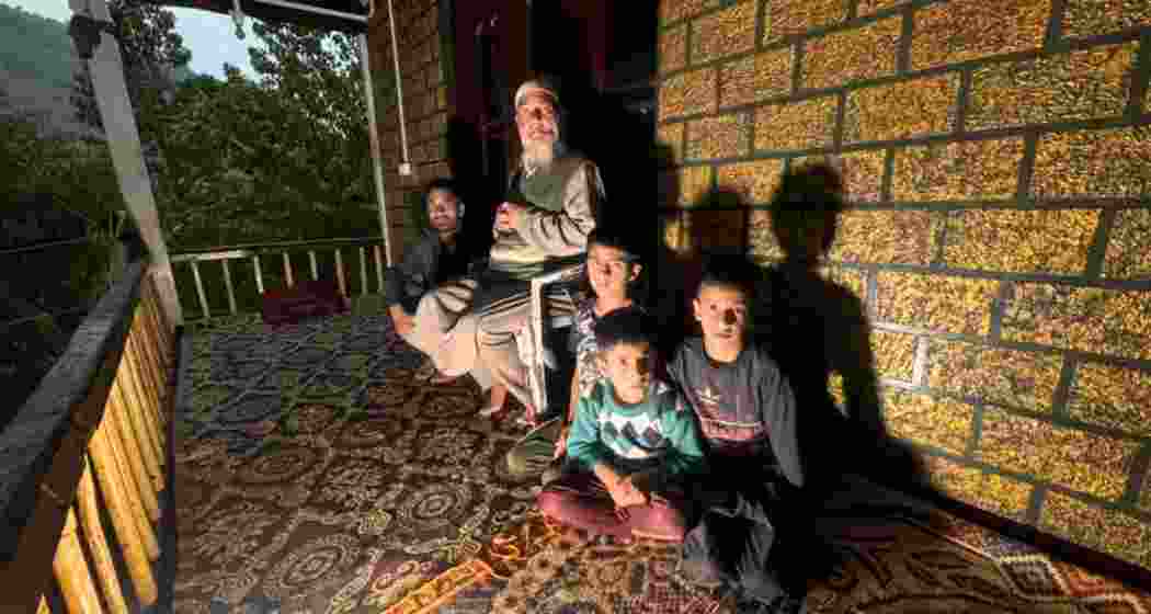 Mohammad Sajjad of Balkote village in Uri, along with his family members, recall the horrors of past shelling, urging those demanding war to witness the harsh reality faced by LoC villagers without bunkers or safety.