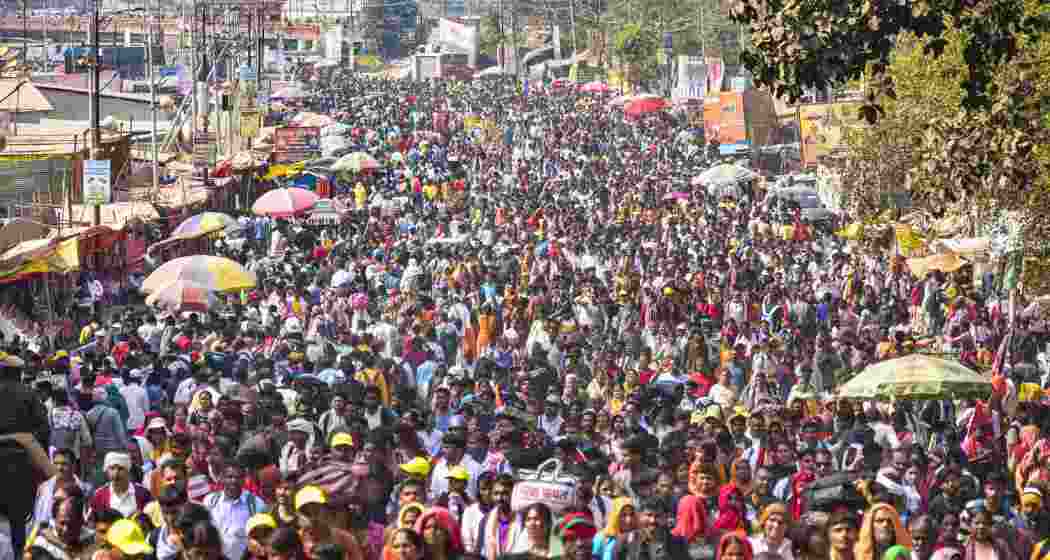 Devotees arrive at Sangam amid a rush during the ongoing Mahakumbh Mela 2025, in Prayagraj on Tuesday, Feb. 18, 2025.