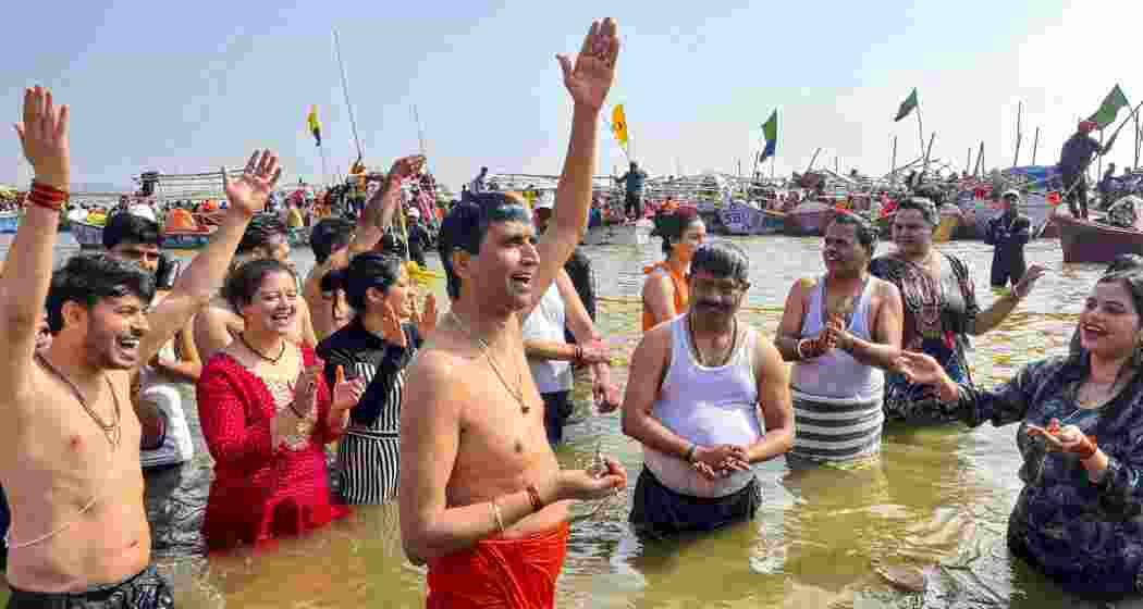 Poet Kumar Vishwas takes a holy dip at Sangam during the Maha Kumbh Mela 2025, in Prayagraj, Uttar Pradesh on Tuesday, Jan. 21, 2025. File photo.