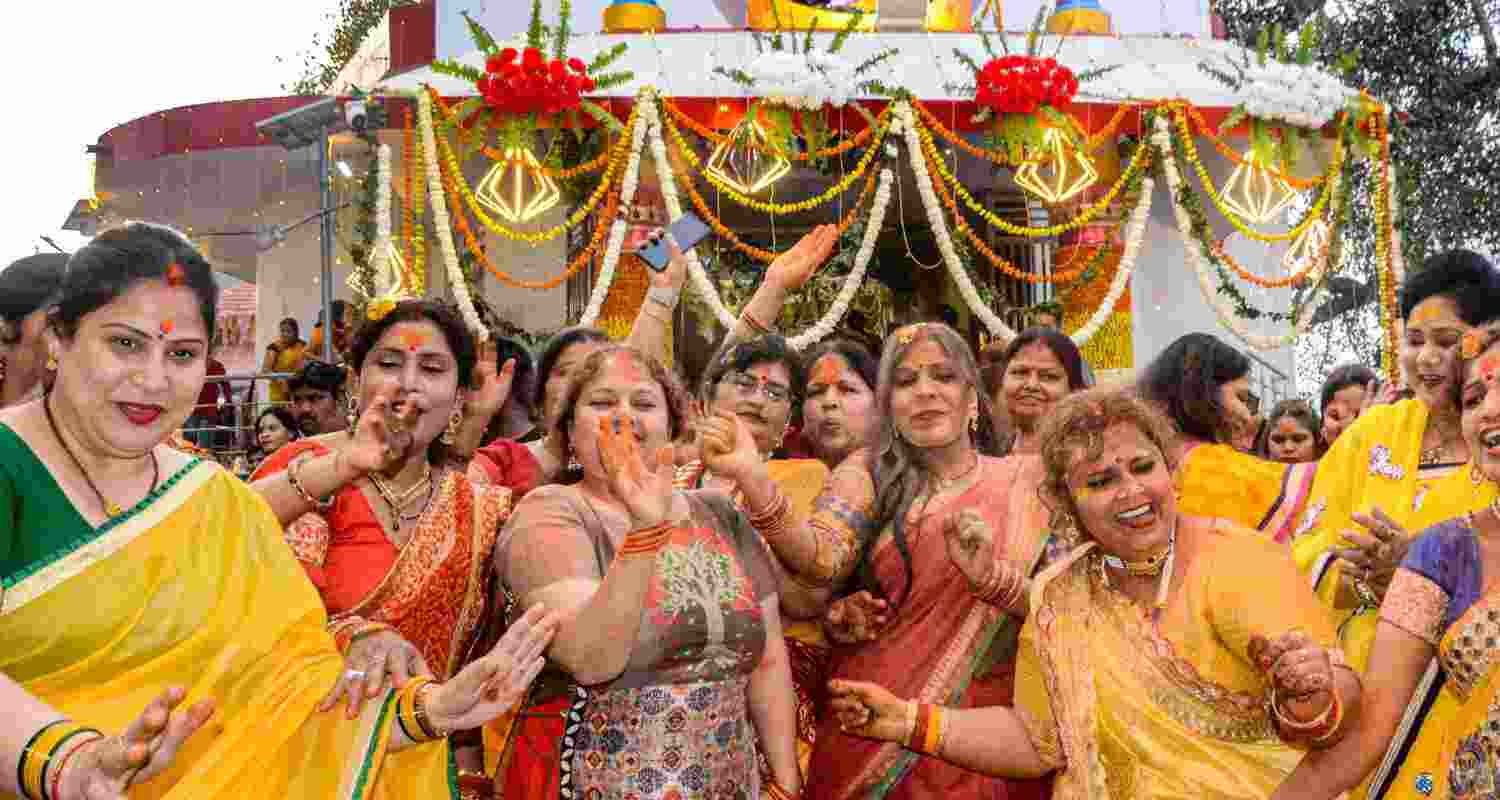 Devotees take part in a procession on the eve of 'Maha Shivratri' festival, at Jageshwar Mahadev temple in Kanpur, Tuesday, Feb. 25, 2025. 