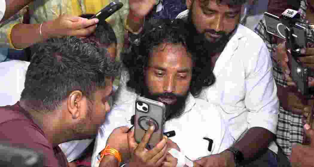 Student leader Devendra Nath Mahto speaks to climate activist Sonam Wangchuk over a video call during his indefinite hunger strike in Ranchi on Wednesday.