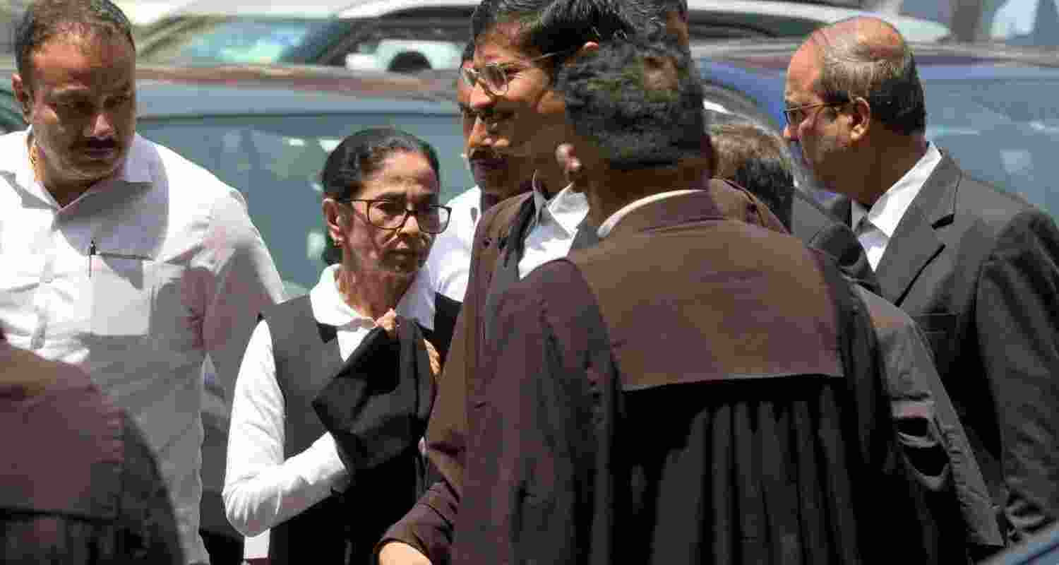 Mamata Banerjee appeared at Calcutta High Court in lawyer’s robes amid a TMC plea over alleged violence linked to BJP-backed miscreants.