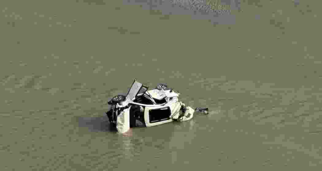 The mangled remains of the car after it plunged into the Teesta gorge along NH-10 near Kalimpong.