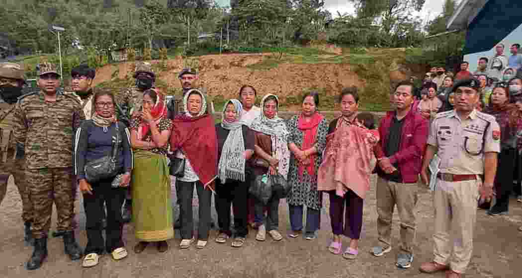 Released members of the Kuki and Naga communities under security escort in Manipur after being allegedly held hostage by armed groups in Kangpokpi and Senapati districts.