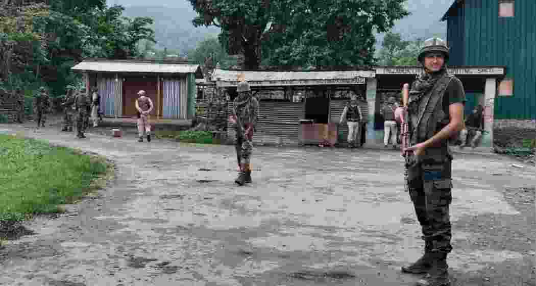 Security forces stand guard in Jiribhim, Manipur, amid escalating tensions. Security forces stand guard in Jiribhim, Manipur, amid escalating tensions.