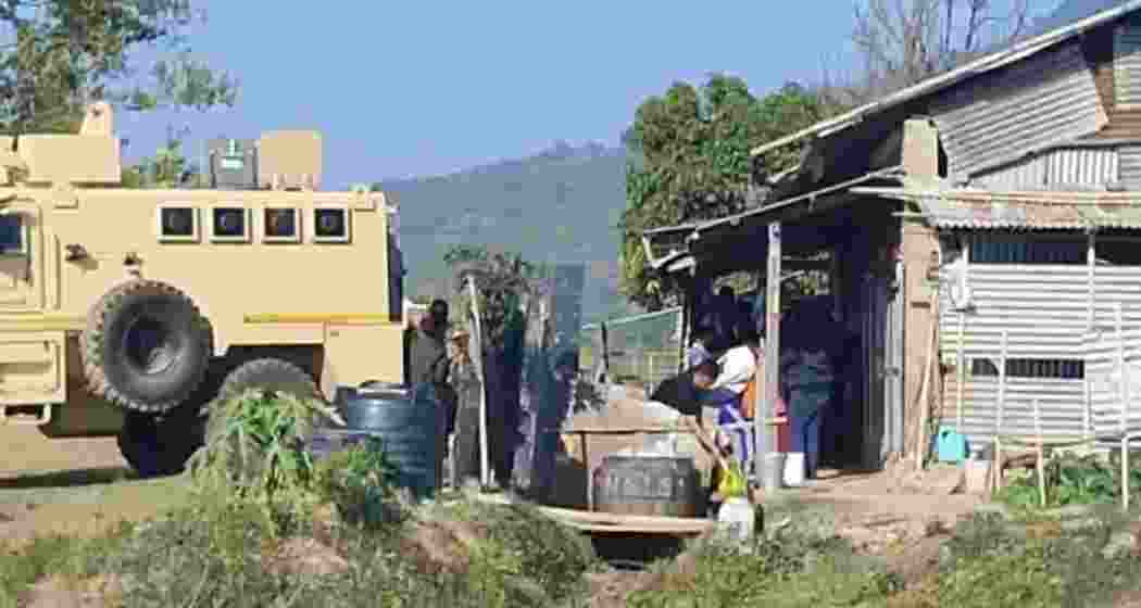 Security personnel in Manipur's Imphal East district taking stock of the situation following gunfire at Sanasabi village in Imphal East.