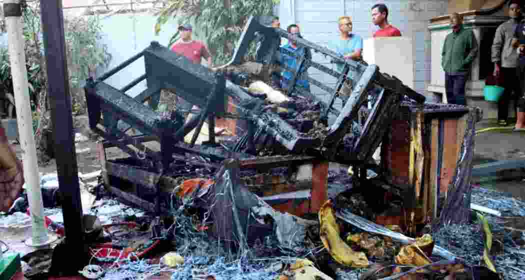 Charred remains of a property and furniture after the violence on November 16.