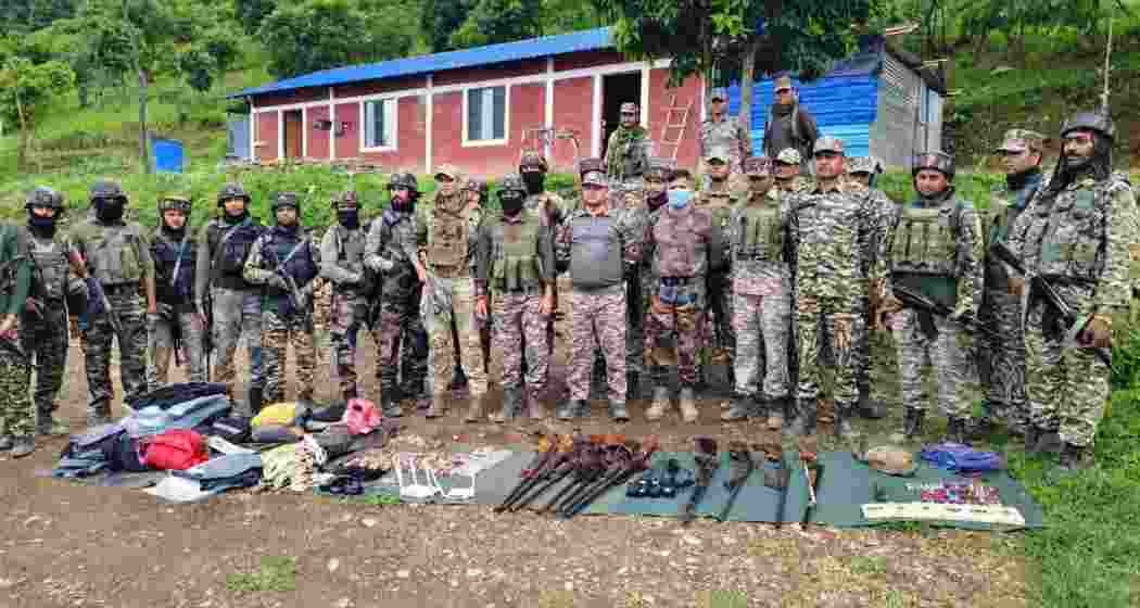 Security personnel display arms, ammunition and protective gear seized during a 36-hour operation across Manipur that saw the dismantling of 61 illegal bunkers and several unauthorised checkpoints.