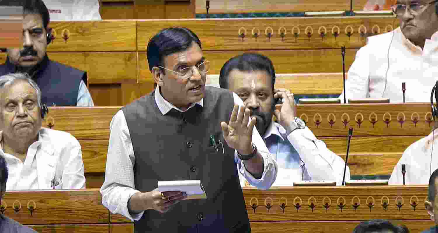 Union Minister Mansukh Mandaviya speaks in the Lok Sabha during the Monsoon session of Parliament, in New Delhi, Monday.