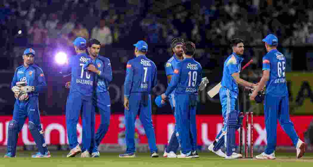 India's captain Shubman Gill and KL Rahul greets Afghanistan's players after winning an ODI cricket match between India and Afghanistan, in Dharamshala, Himachal Pradesh, on Saturday.