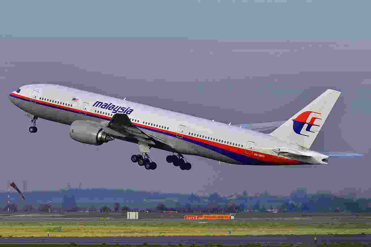 An image of a Malaysian airlines airplane taking off. An image of a Malaysian airlines airplane taking off.