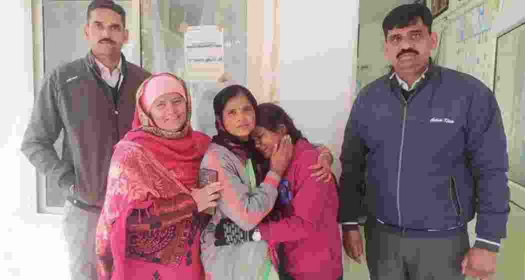 Haryana Police personnel with a family after the Panchkula Anti-Human Trafficking Unit reunited 22-year-old Neha, missing for 15 years from Maharashtra’s Wardha district, with her relatives. 