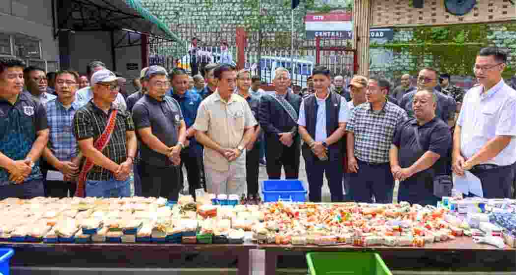 Mizoram Chief Minister Lalduhoma with officials alongside narcotics seized during an earlier raid in Champhai district; the state has recorded its largest-ever drug haul amid intensified anti-trafficking operations.