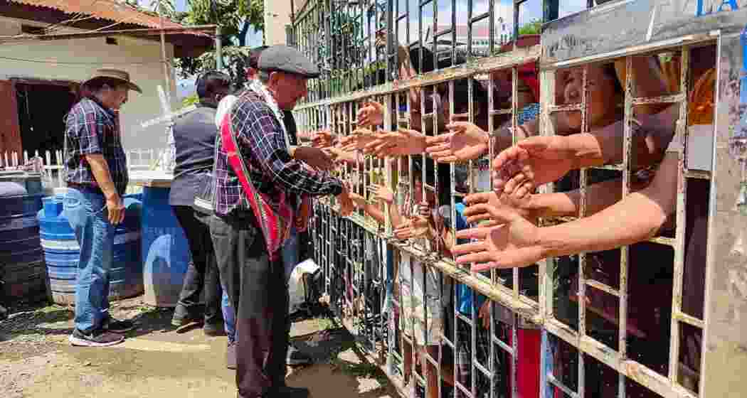 Indian citizens shake hands with Myanmar nationals during a rally against scrapping of the Free Movement Regime (FMR), at Indo-Myanmar Friendship Gate, at Zokhawthar village along India-Myanmar border, in Champhai district of Mizoram on Thursday, May 16, 2024. Indian citizens shake hands with Myanmar nationals during a rally against scrapping of the Free Movement Regime (FMR), at Indo-Myanmar Friendship Gate, at Zokhawthar village along India-Myanmar border, in Champhai district of Mizoram on Thursday, May 16, 2024.