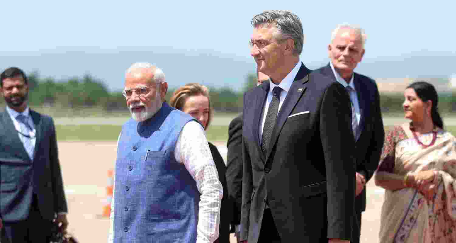 India's Prime Minister Narendra Modi, centre left, is welcomed by Croatian Prime Minister Andrej Plenkovic upon his arrival for an official visit at Zagreb Airport in Croatia, Wednesday.