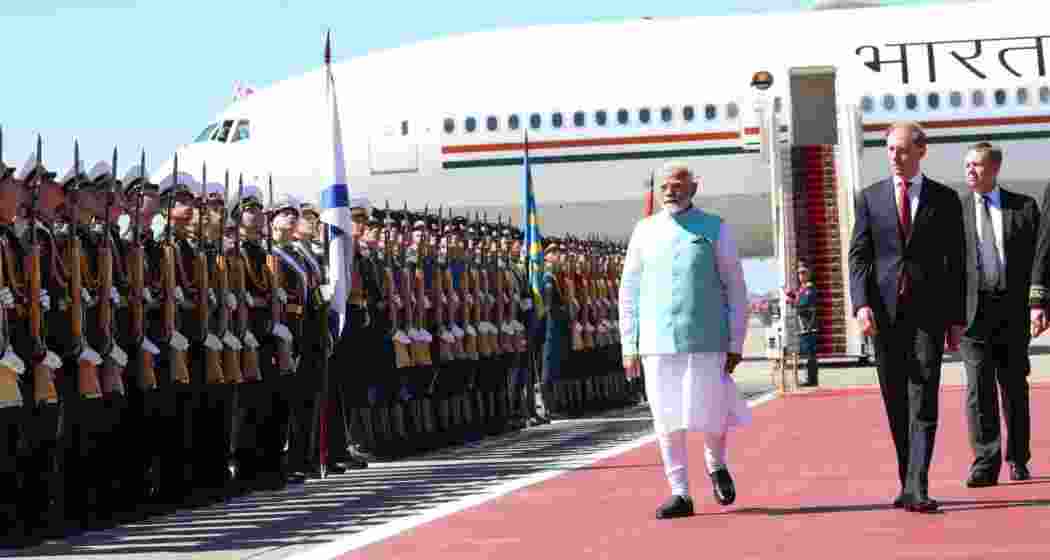 Prime Minister Narendra Modi greeted by Russia's First Deputy Prime Minister Denis Manturov at Moscow's Vnukovo-II airport. Prime Minister Narendra Modi greeted by Russia's First Deputy Prime Minister Denis Manturov at Moscow's Vnukovo-II airport.