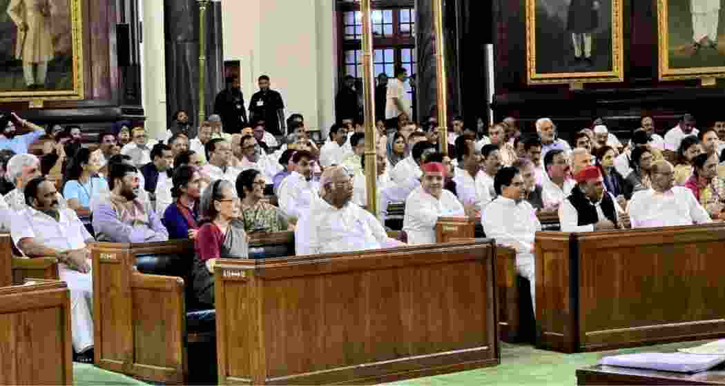 Opposition MPs attend a mock poll session in Central Hall of Parliament regarding the voting process for the Vice Presidential election.