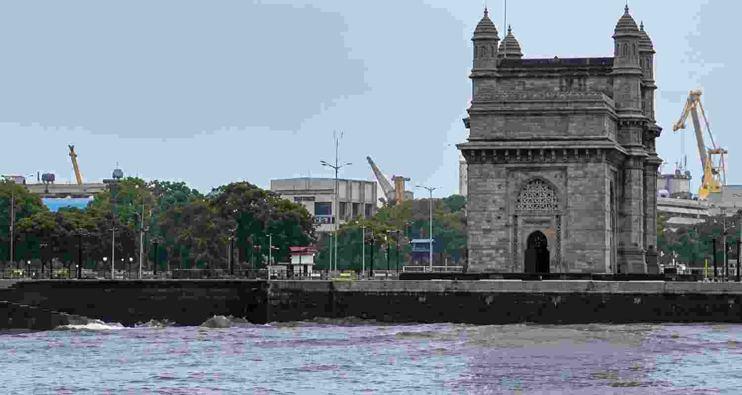 IMD forecasts heavy rain and strong winds in Mumbai, disrupting rail services. Several trains cancelled as waterlogging hits Western Railway.