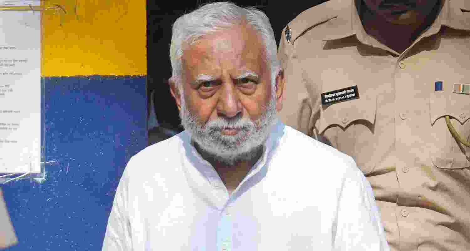 Photograph of Naresh Goyal, founder of Jet Airways, exiting a jail facility and heading to a court hearing.